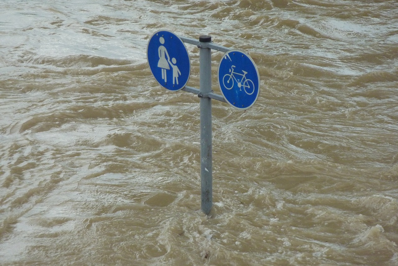 Flooded street in Chichester- leaking pipe damage in Chichester