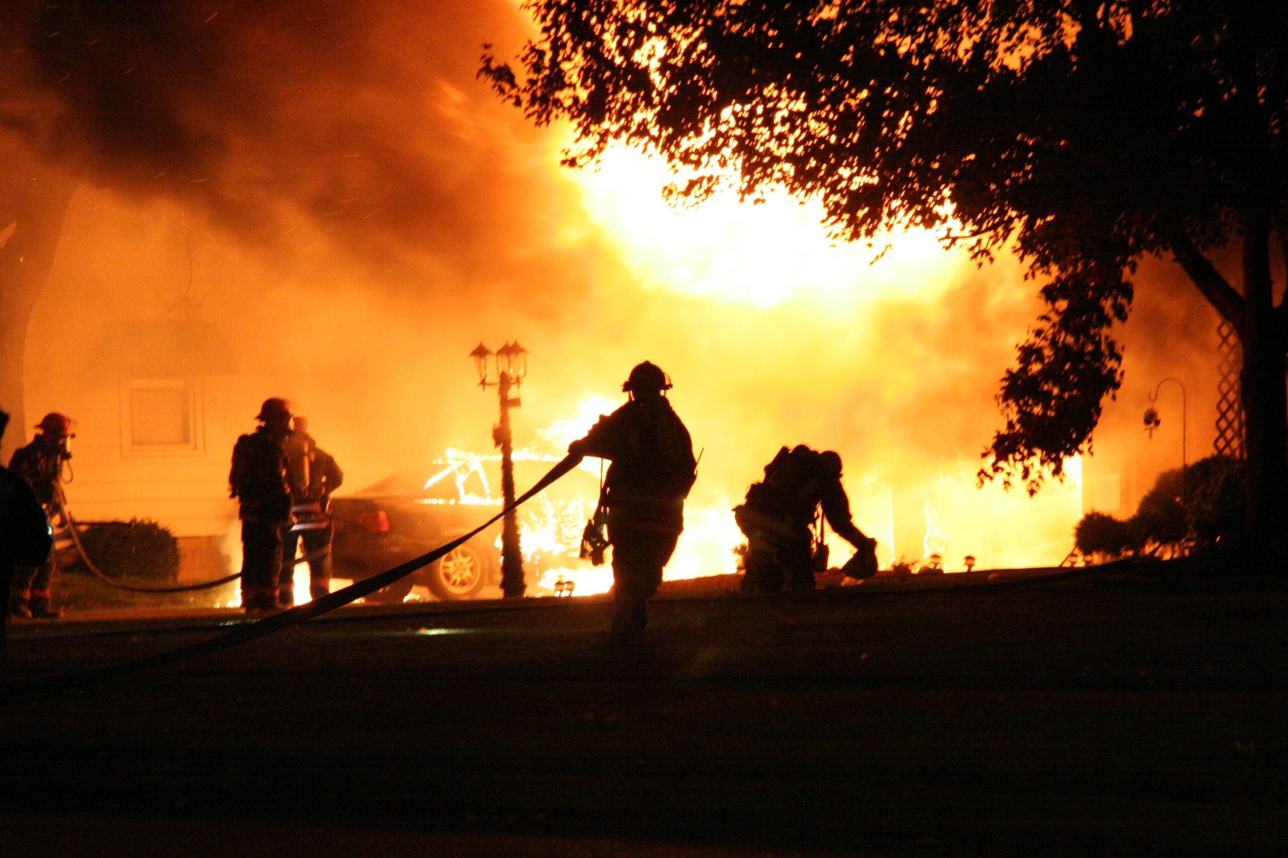 Commercial Fire Insurance Coverage - Fire fighters sillhouette